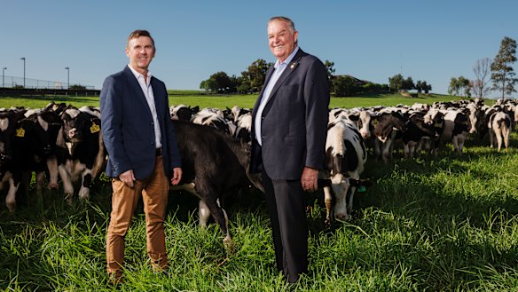 Tony Perich, right, and his son Mark Perich on their dairy farm, which is the subject of an audit report over the Commonwealth's handling of its $30 million purchase.