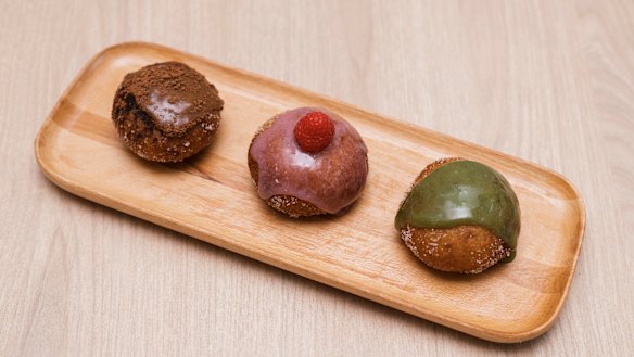 Comeco Foods' signature sourdough doughnuts - (from left) mocha custard, raspberry custard and macha custard.