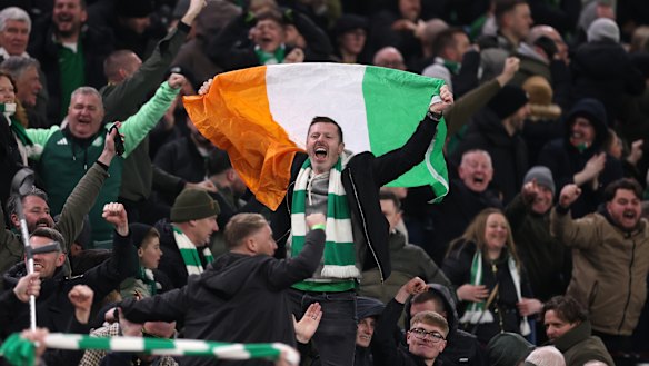 Celtic fans celebrate at Villa Park.