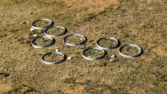 As part of the zoo and NSW government’s Saving our Species program, round semi-enclosed pens in the Kosciuszko National Park keep the southern corroboree frogs safe from predators. 