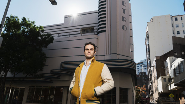 Minerva Theatre Action Group spokesman Brandon Martignago outside the art deco building.