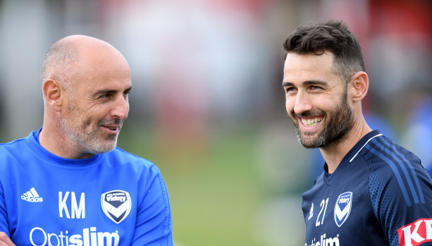 Cool, calm and collected Carl Valeri sharing a laugh with Victory coach Kevin Muscat.