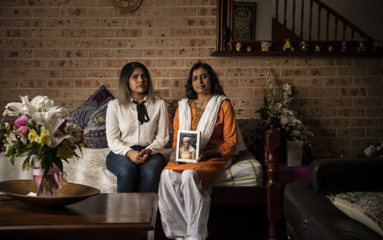 Charishma Kaliyanda with her mother Bhanu Chottera. Bhanu is holding a photo of her mother Gangamma Chottera who passed away last week in India. 