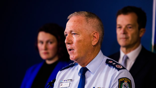 NSW Police Commissioner Mick Fuller with sexual assault campaigner Saxon Mullins and NSW Attorney-General Mark Speakman, announcing the proposed changes to sexual consent laws. 