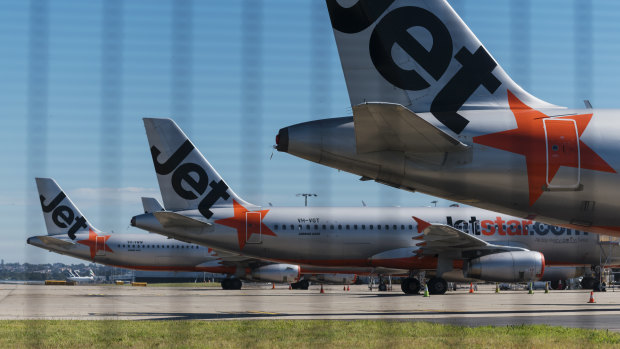 Jetstar jets grounded at Sydney Airport. Cheap fares could be used to stimulate demand once travel restrictions lift. 