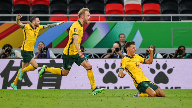 Australia’s Ajdin Hrustic (No.10) celebrates the winner against the UAE.