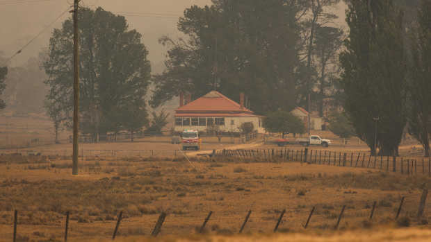 An RFS Team watch at a property in the Shannons Flat region, in case of ember attack.