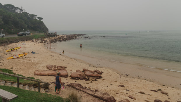 Merimbula's Bar Beach is usually crowded with tourists in January.