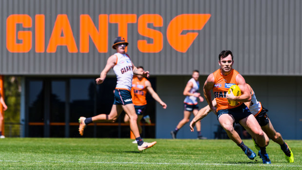 The Giants train in soaring temperatures at Sydney Olympic Park on Wednesday.