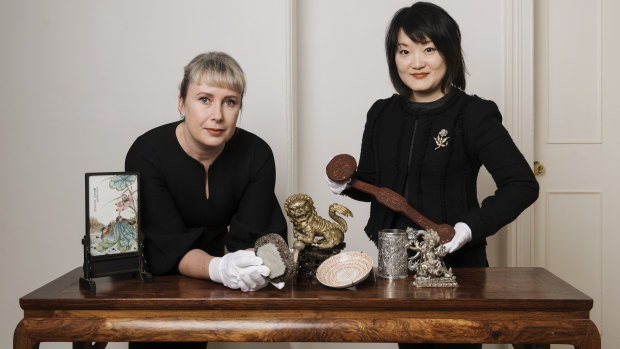 Merryn Schriever and Asian art specialist Yvett Klein with some of the Grice collection.