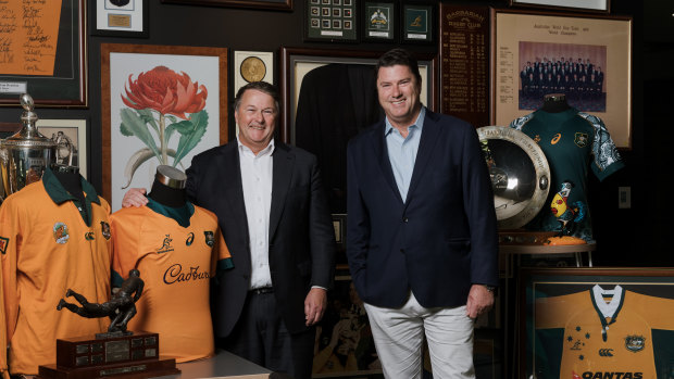 David Harrison and Hamish McLennan with rugby memorabilia at Rugby Australia headquarters.