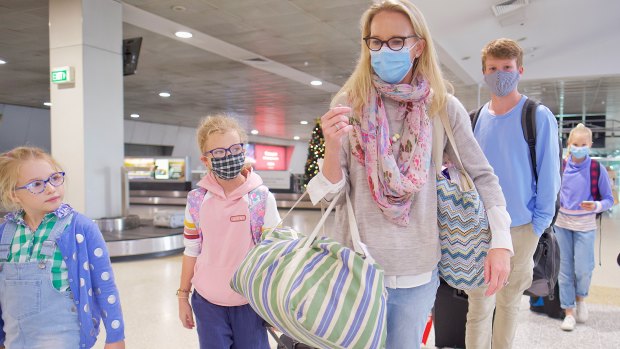 Edwina Rouse and her four children arrive from Sydney into Melbourne on Saturday morning. 