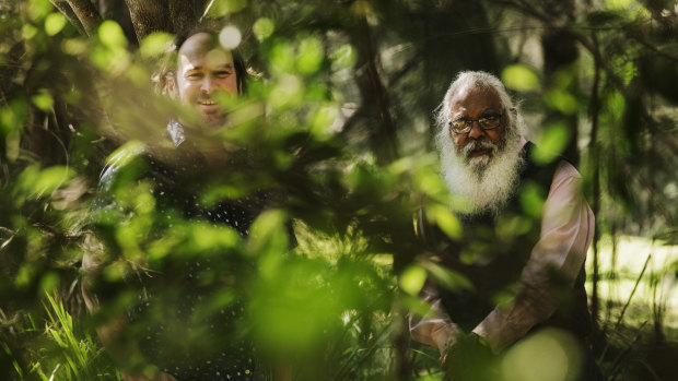 Musical journey: Damian Barbeler and Yuin elder Uncle Max Harrison in the Woronora. 