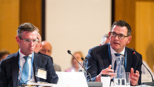 NSW Premier Dominic Perrottet and Victorian counterpart Daniel Andrews at the federal government’s jobs summit last year.