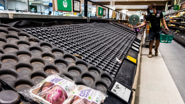 Empty fresh produce shelves at Woolworths in Sydney’s Neutral Bay on Friday.