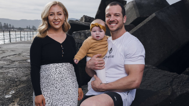 Mullen with partner Tam Chessell and six-month-old daughter Stevie.