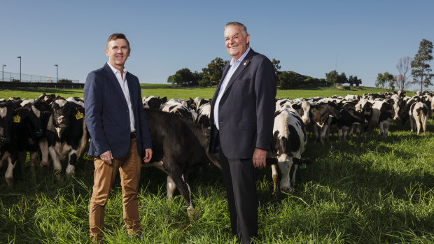 Tony Perich, right, and his son Mark Perich on their dairy farm, which is the subject of an audit report over the Commonwealth's handling of its $30 million purchase.