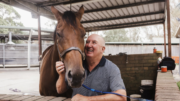 Old mates: Pat Webster with his champion galloper Happy Clapper.