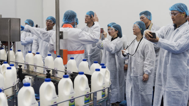 Officials and members of Chinese state owned media companies visit the A2 Milk factory in Sydney. 