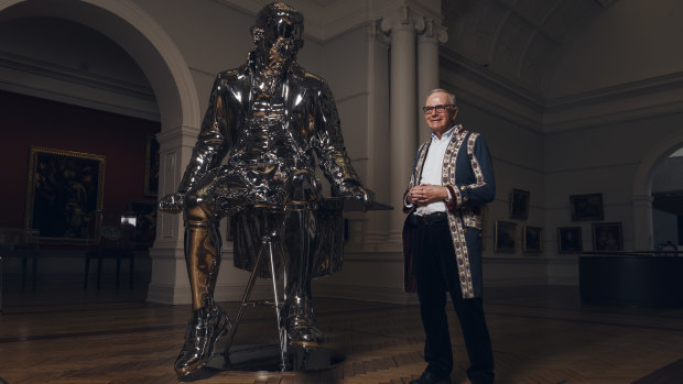 Captain Cook enthusiast Donald Heussler, pictured next to a sculpture of Captain Cook entitled The English Channel by New Zealand artist Michael Parekowhai at the Art Gallery of NSW 