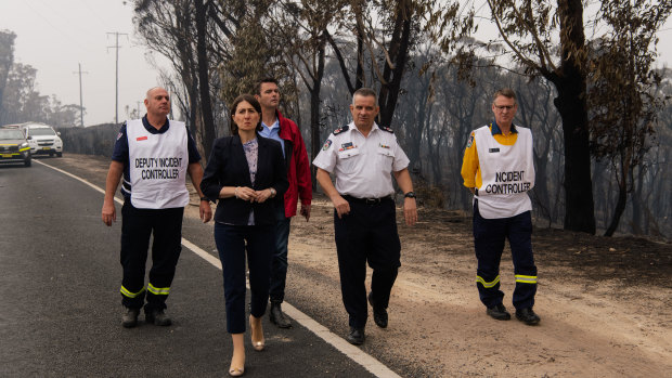 NSW Premier Gladys Berejiklian and RFS Deputy Commissioner Rob Rogers visit The Darling Causeway, Mt Victoria on Monday.