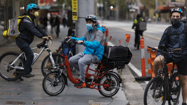 Food delivery cyclists working during the coronavirus lockdown in Sydney's CBD. 