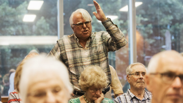 An attendee speaks out against changes to franking credits at the public hearing at Chatswood, Sydney. 