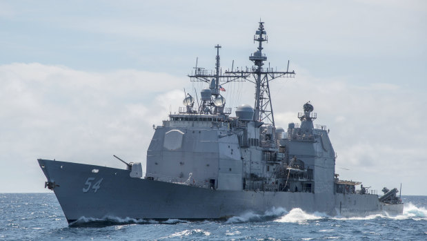 A Ticonderoga-class guided-missile cruiser USS Antietam sails in the South China Sea. 