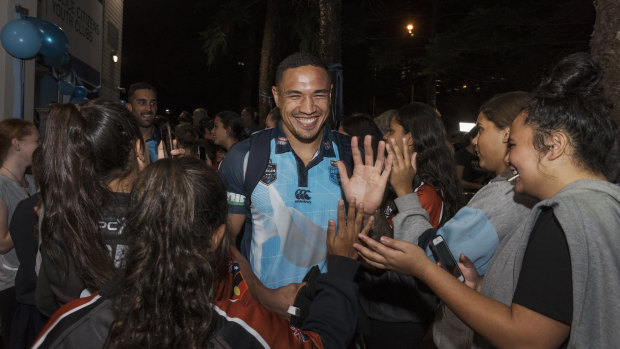Reaching out: NSW forward Tyson Frizell greets fans at the Woolloomooloo PCYC on Tuesday night.