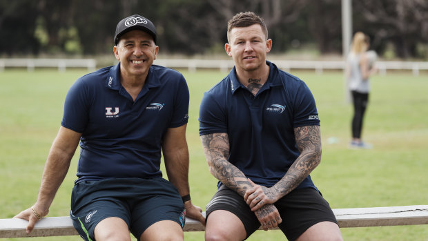 Back in game: Todd Carney (right) in Sydney last month with sprint coach Roger Fabri.