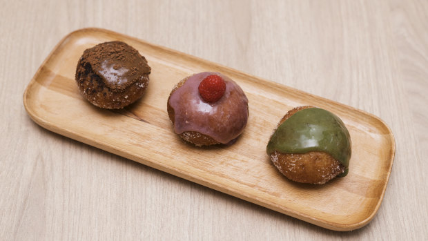 Comeco Foods' signature sourdough doughnuts - (from left) mocha custard, raspberry custard and macha custard.