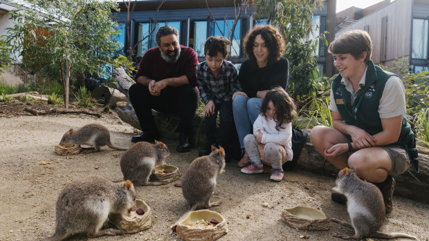 Mick and Rachael Bruzzese, with their children Cassius and Paola, at Taronga's Wildlife Retreat.