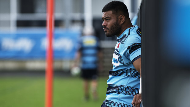 Tolu Latu takes a break at training this week after a punishing fitness regime in preparation for his playing return. 