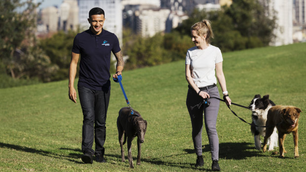 Next chapter: Tim Cahill pictured with Alicia Fuller, the GM of Greyhounds As Pets NSW for which the former Socceroos is now an ambassador.