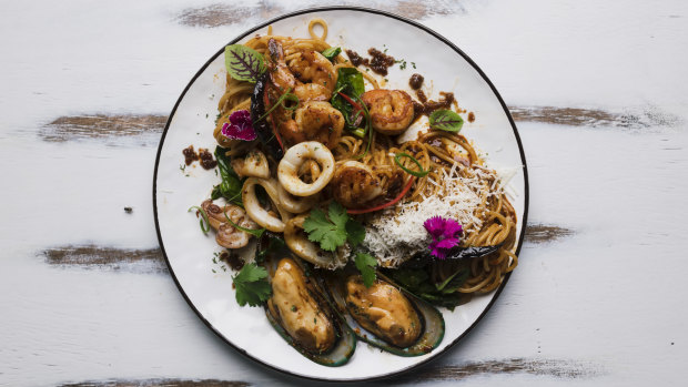 Bar Pesta's XO seafood spaghetti features a generous medley of sliced squid, New Zealand mussels and tiger prawns. 