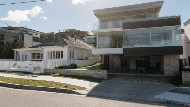 Making waves: Adam Gilchrist will keep the house on the left and knock down the house on the right to make way for a swimming pool. 