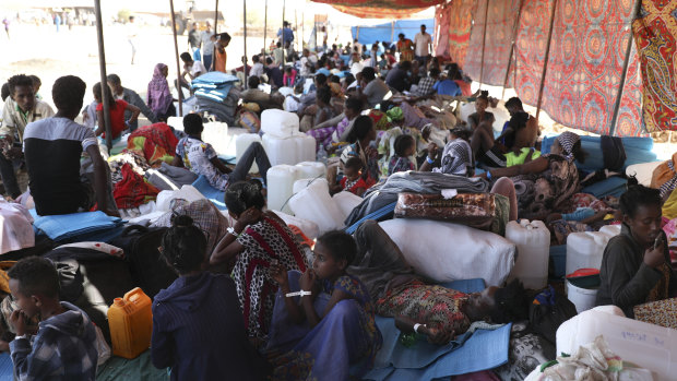 Ethiopian refugees rest in Qadarif region, Sudan, after fleeing the fighting in Tigray.