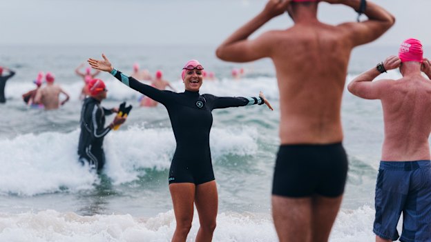Members of Bold and Beautiful swim squad hit the surf at Manly in 2018.
