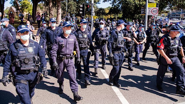 Police swarm Broadway near Sydney’s CBD to arrest anti-lockdown protesters at a rally in August 2021.