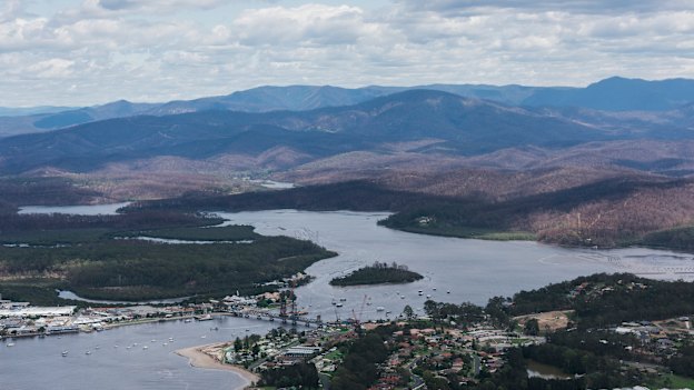 An aerial photo of bushfire affected areas on the outskirts of Batemans Bay taken from an MRH90 Taipan helicopter.