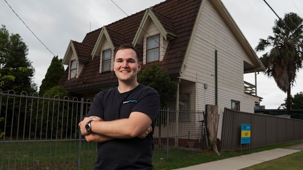 Eddie Dilleen, a 28-year-old property investor who bought 16 houses and apartments during the housing boom pictured outside one of his latest purchases in Wentworthville. 