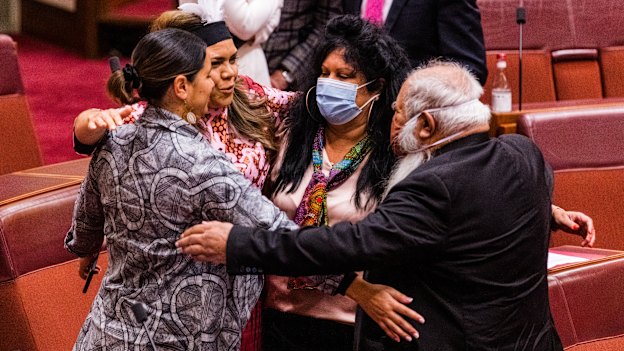 After her first speech in the Senate in July, Jacinta Price (second from left) is embraced by (from left) Labor senators Jana Stewart, Malarndirri McCarthy and Pat Dodson.