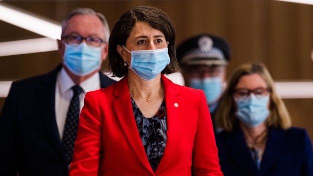 Premier Gladys Berejiklian, Health Minister Brad Hazzard, Chief Health Officer Dr Kerry Chant and Police Deputy Commissioner Gary Worboys after a COVID-19 briefing. Lockdown communities say there needs to be more consultation.
