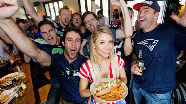 Waitress Emma King and Super Bowl fans in Paddington in 2015.