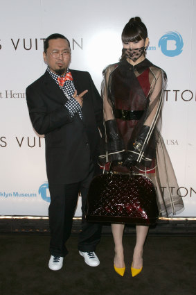 Takashi Murakami and Chiho Aoshima arrive at an art opening in the US in 2005.