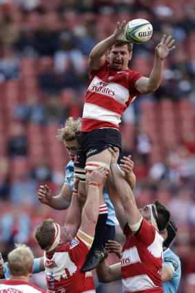 Marvin Orie flies high for the Lions to win the ball during the Super Rugby semi-final against the Waratahs at Ellis Park on Saturday.