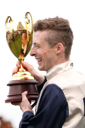 Harry Coffey savours winning the 2024 Caulfield Cup.