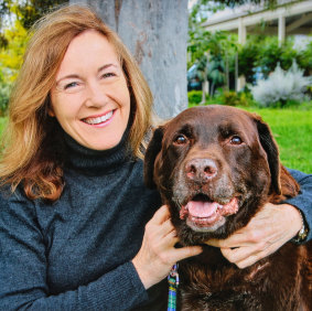 Patricia Stewart with her chocolate labrador Dougal.