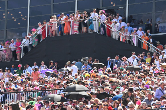 Racegoers pack the stands at Flemington for the Melbourne Cup.