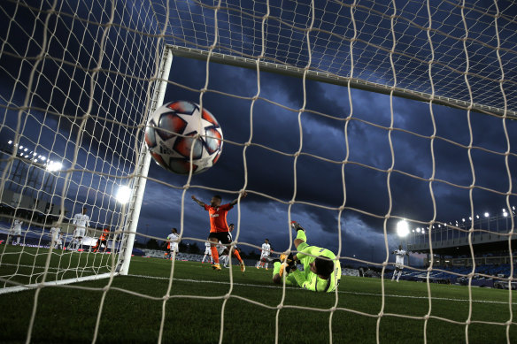 Real Madrid gloveman Thibaut Courtois fails to stop an own goal from teammate Raphael Varane during the Spaniards' shock Champions League loss to Shakhtar Donetsk.